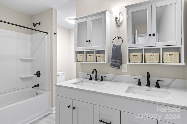 full bathroom with vanity, toilet, and shower / bathtub combination