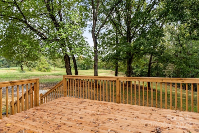 deck featuring a yard