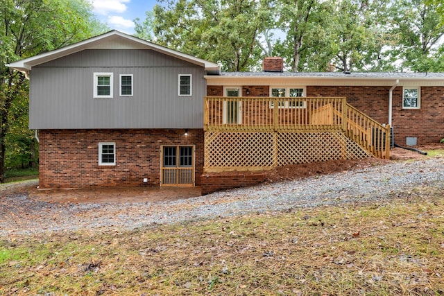 rear view of house with a deck