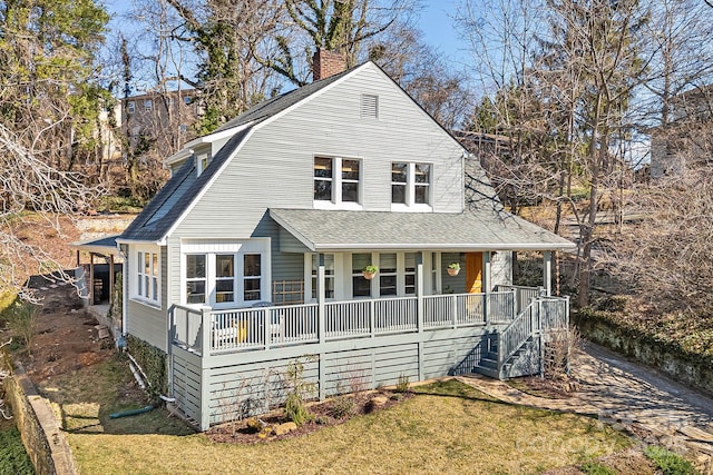 22 Kenilwood Pl, Asheville, NC 28803 - view of front of home featuring a porch, a chimney, a front yard, a shingled roof, and stairs