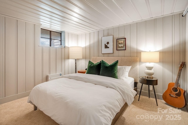 22 Kenilwood Pl, Asheville, NC 28803 - bedroom featuring carpet floors and a decorative wall