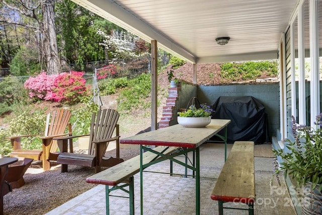 22 Kenilwood Pl, Asheville, NC 28803 - covered porch featuring a grill and a patio
