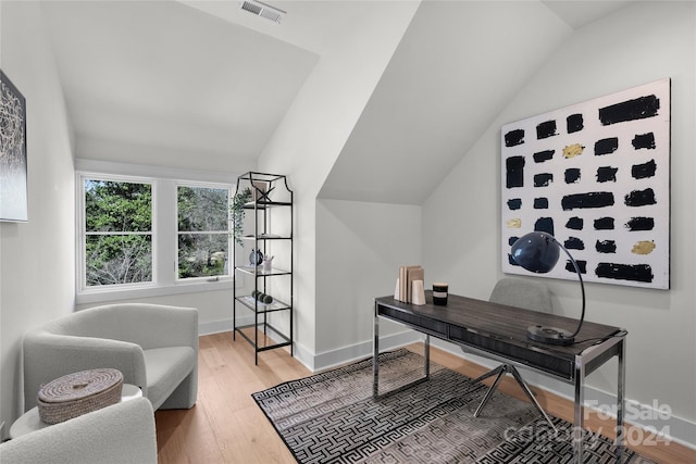 3109 Colyer Pl, Charlotte, NC 28205 - office with lofted ceiling, wood finished floors, visible vents, and baseboards