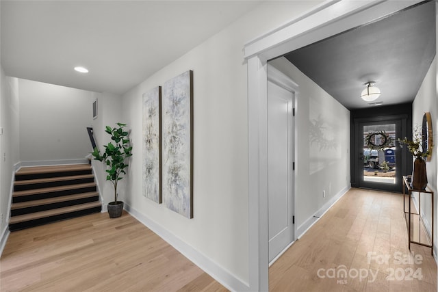 corridor featuring light hardwood / wood-style flooring