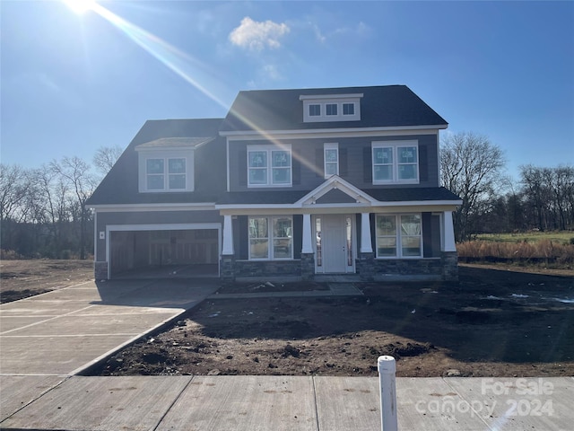 view of front of house with a garage