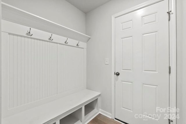 mudroom with wood-type flooring