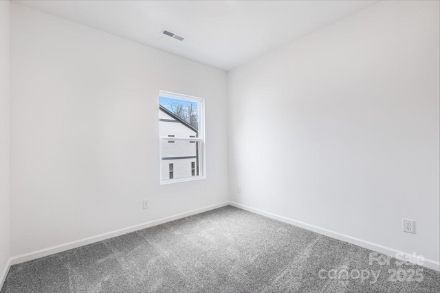 view of carpeted spare room