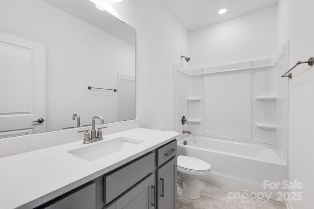 full bathroom featuring vanity, toilet, and  shower combination