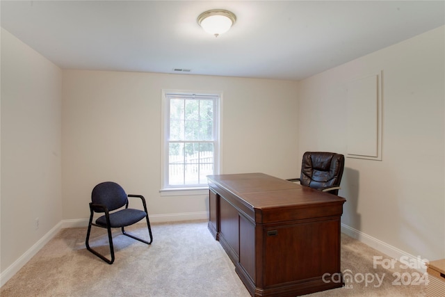 office space with light colored carpet