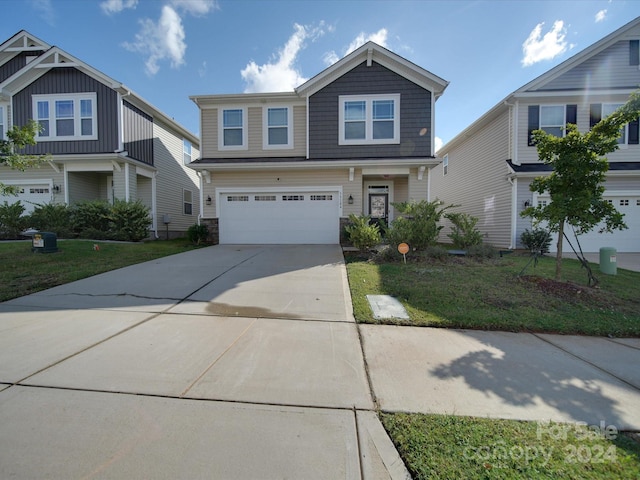 view of front of property featuring a garage