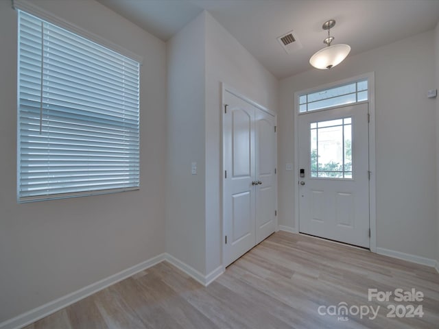 entrance foyer featuring light hardwood / wood-style floors