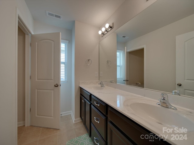 bathroom featuring vanity and tile patterned floors