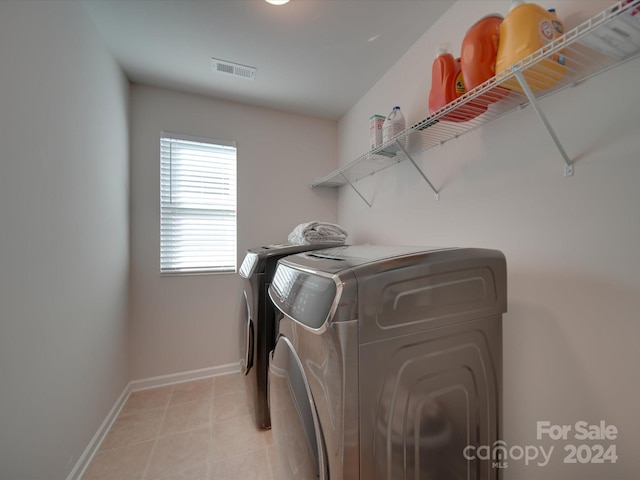 laundry area featuring separate washer and dryer