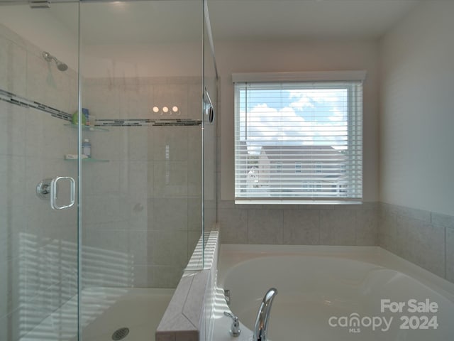 bathroom with plus walk in shower