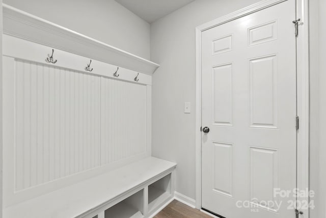 mudroom with hardwood / wood-style flooring