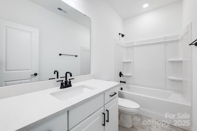 full bathroom featuring shower / tub combination, toilet, and vanity