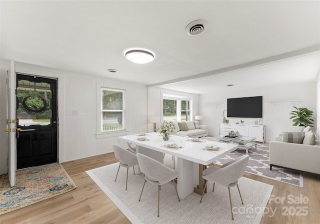 dining room featuring light wood-type flooring