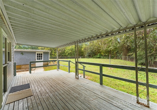 wooden deck with a yard