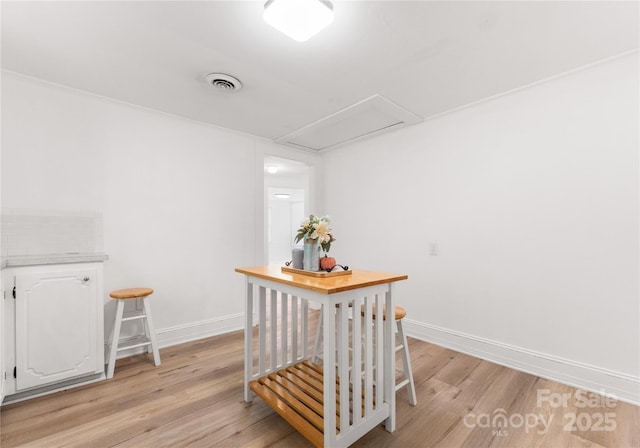 dining room with light wood-type flooring