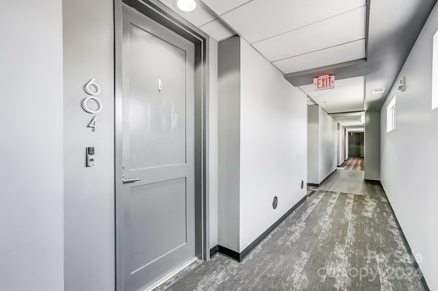 corridor featuring hardwood / wood-style flooring