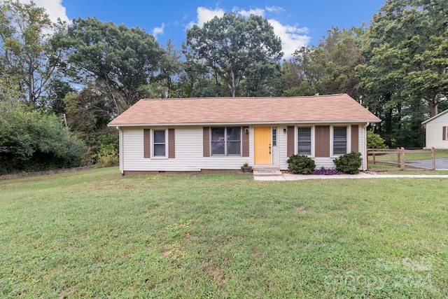 view of front of property with a front lawn