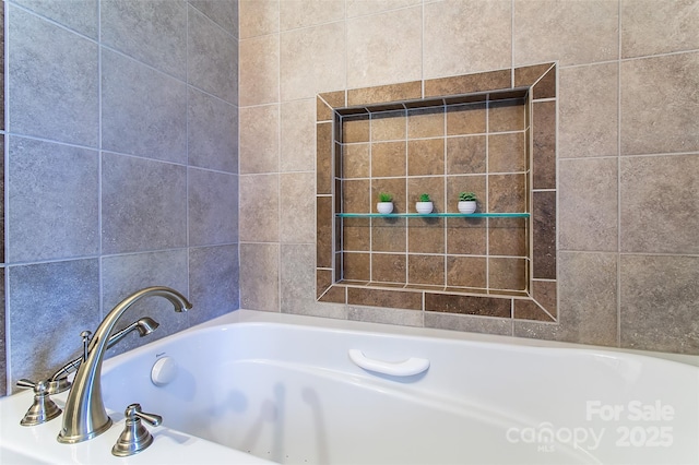 bathroom featuring a washtub