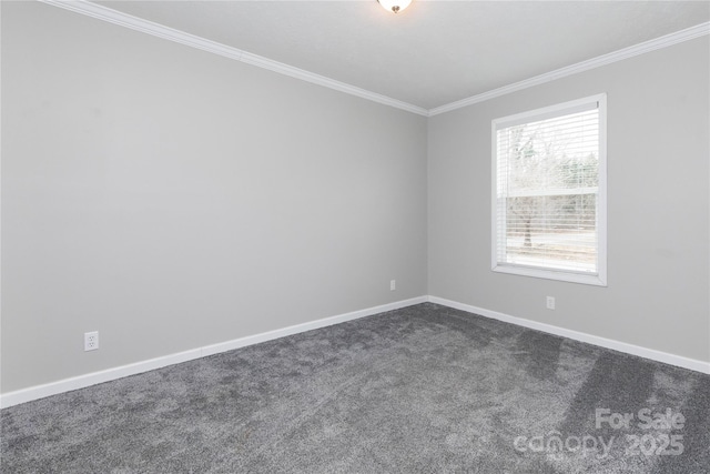 unfurnished room with dark colored carpet and ornamental molding