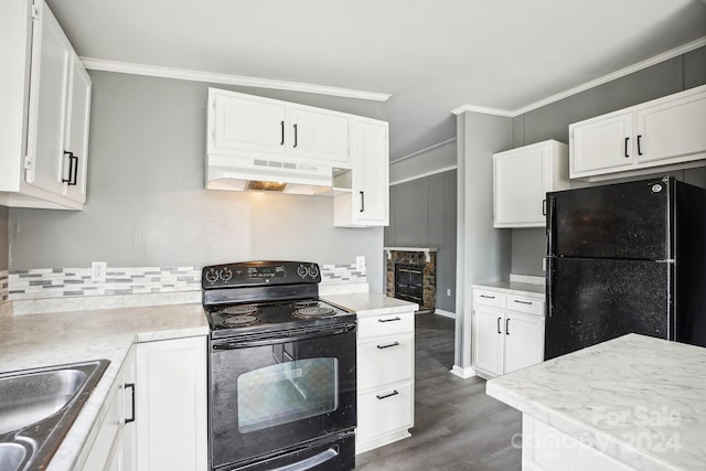 kitchen featuring black appliances, ornamental molding, dark hardwood / wood-style floors, white cabinets, and exhaust hood