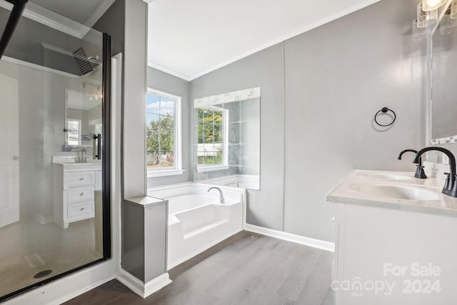 bathroom with lofted ceiling, wood-type flooring, plus walk in shower, ornamental molding, and vanity