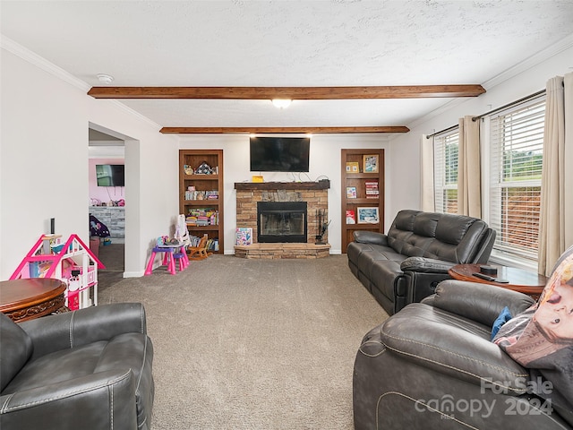 carpeted living room with ornamental molding, a textured ceiling, beamed ceiling, and a fireplace