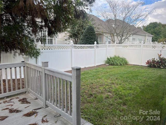 view of yard featuring a wooden deck