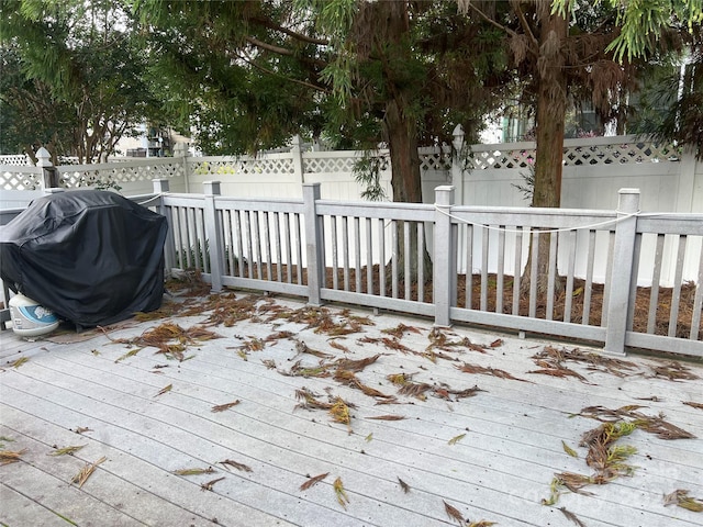 wooden deck with area for grilling