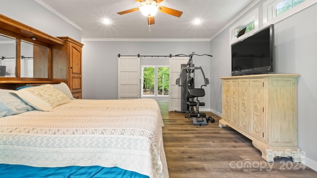 bedroom featuring ornamental molding, ceiling fan, multiple windows, and dark wood-type flooring