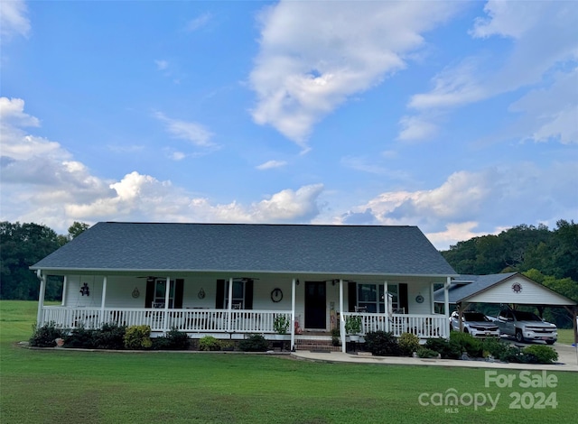 view of front of property with a front lawn and covered porch