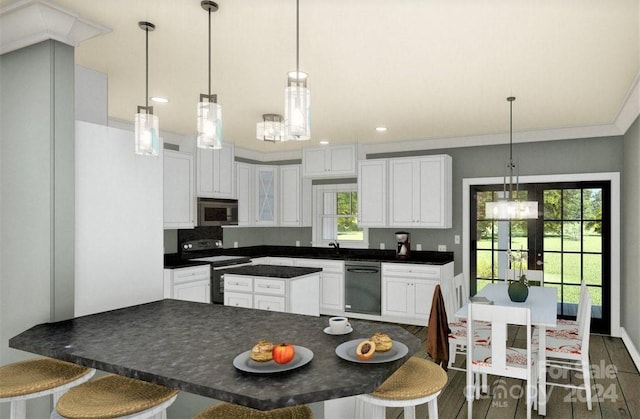 kitchen featuring appliances with stainless steel finishes, dark wood-type flooring, white cabinetry, and a wealth of natural light