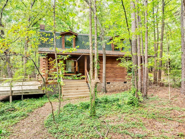 view of front of house with a deck