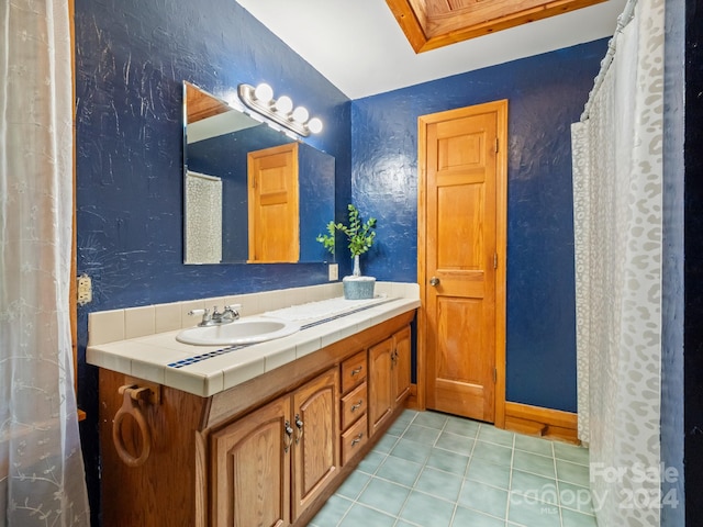 bathroom featuring vanity and tile patterned floors