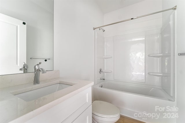 full bathroom with washtub / shower combination, toilet, and vanity