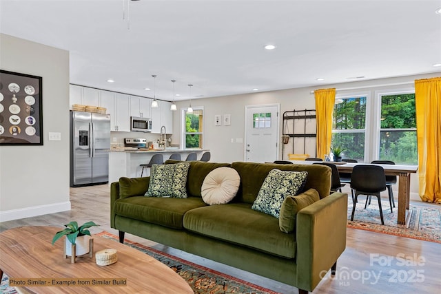 376 Hague Dr, Columbus, NC 28722 - living area with light wood finished floors, recessed lighting, and baseboards