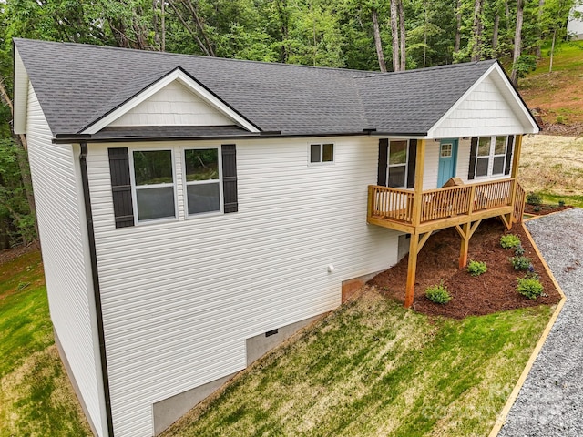 376 Hague Dr, Columbus, NC 28722 - view of front of house featuring roof with shingles, covered porch, crawl space, and a front yard