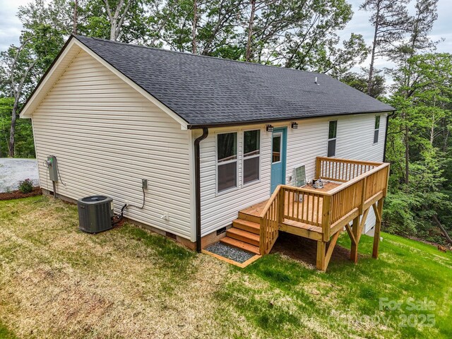 376 Hague Dr, Columbus, NC 28722 - rear view of property featuring crawl space, a shingled roof, a wooden deck, a yard, and central AC unit