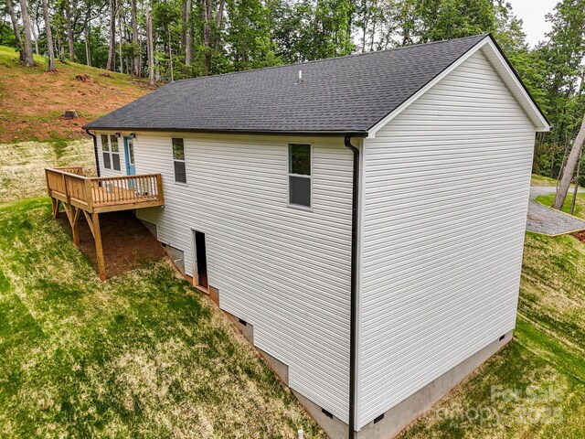 376 Hague Dr, Columbus, NC 28722 - view of side of property with crawl space, a deck, and a lawn