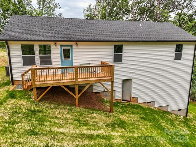 376 Hague Dr, Columbus, NC 28722 - back of property featuring crawl space, a deck, a yard, roof with shingles, and cooling unit