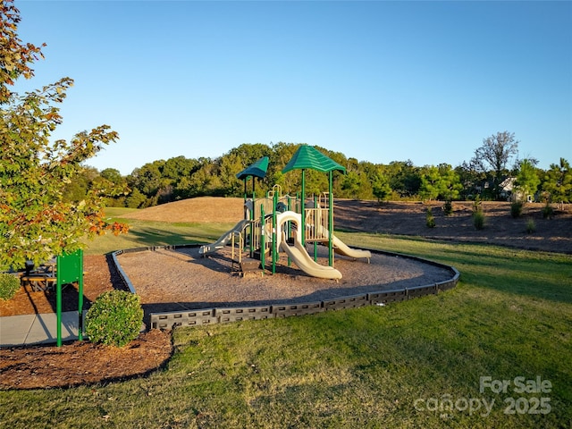 view of playground with a yard