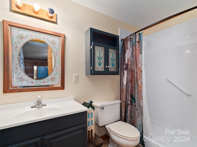 229 Medford Hannah Rd, Waynesville, NC 28785 - full bath featuring vanity, toilet, and a shower with shower curtain