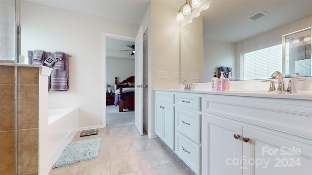 bathroom featuring ceiling fan and vanity