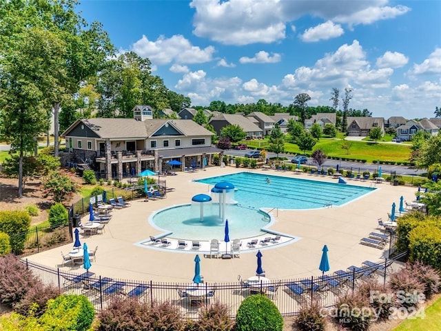 view of pool featuring a patio area