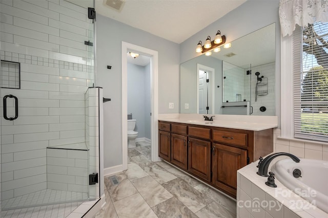 29 Daves Rd, Mooresboro, NC 28114 - full bathroom featuring a shower stall, plenty of natural light, vanity, toilet, and a textured ceiling