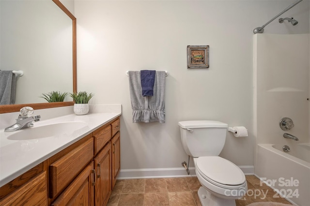 full bathroom with vanity, shower / tub combination, and toilet