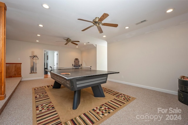 game room with light colored carpet and ceiling fan